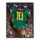 Tableau Lions Indomptables avec maillot vert du Cameroun numéro 10 dans un stade